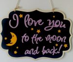 black wooden sign with quotes : I love you to the moon and back